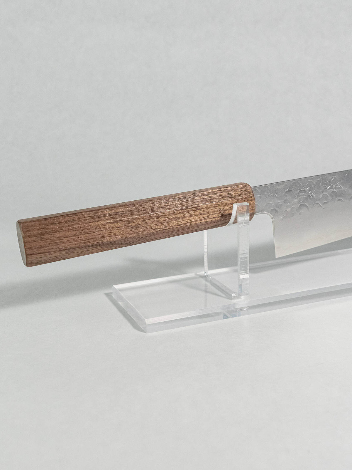 Close-up of the walnut handle on Hado Shiosai Kiritsuke knife
