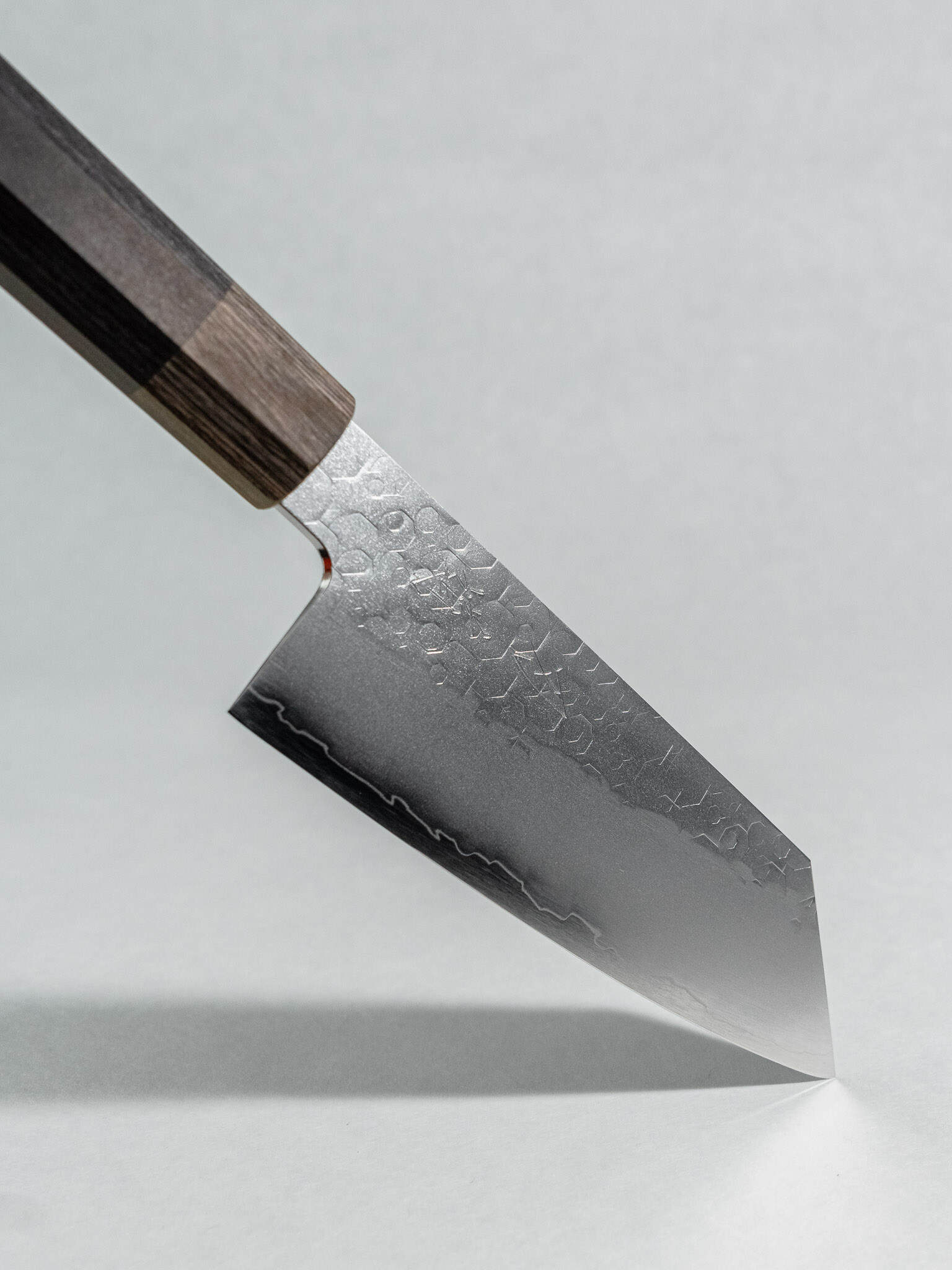Close-up of geometric hammered tsuchime finish on Hado Shiosai Ko-Bunka with soft kasumi transition