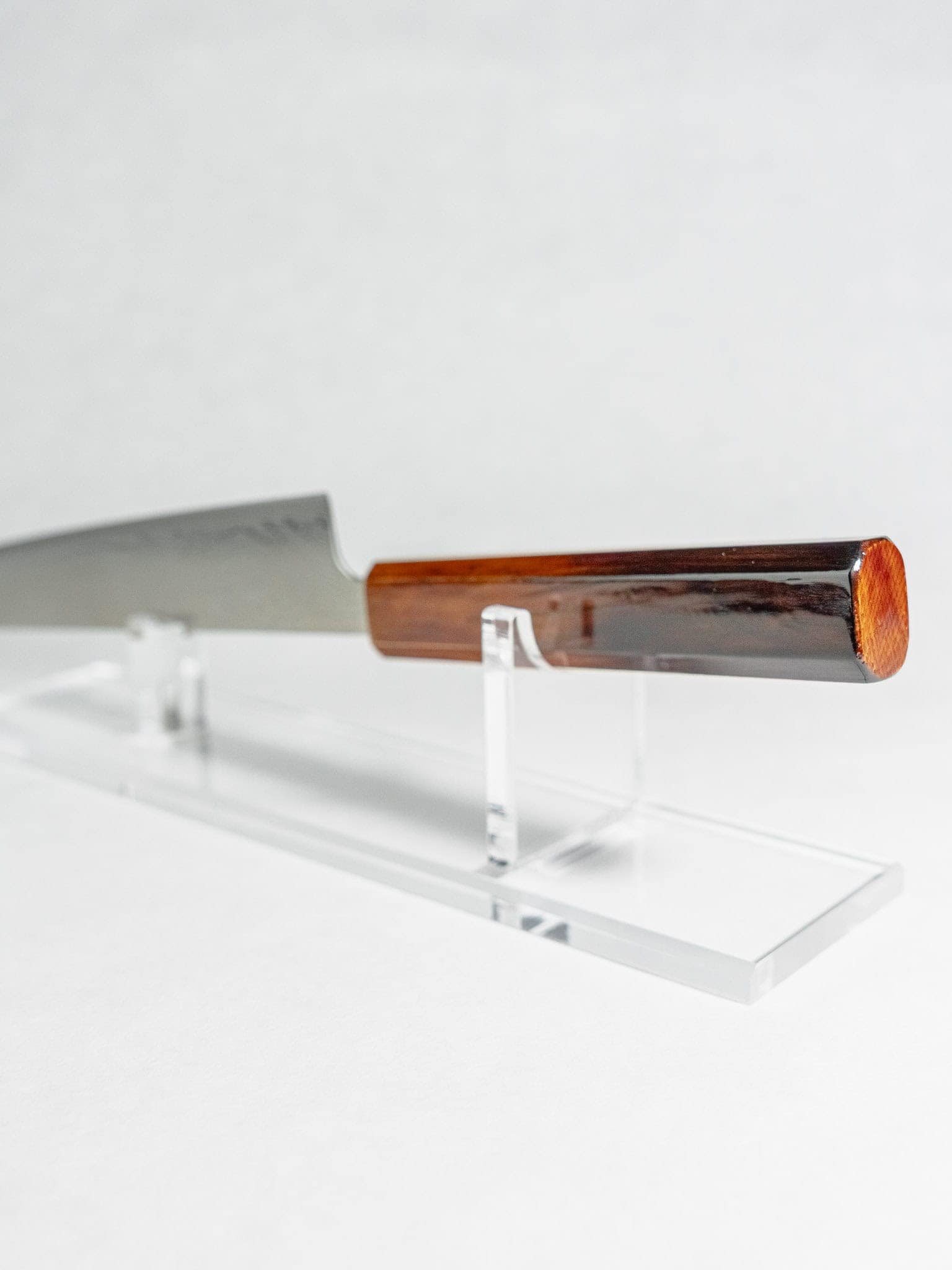 Lacquered octagonal burnt oak handle detail