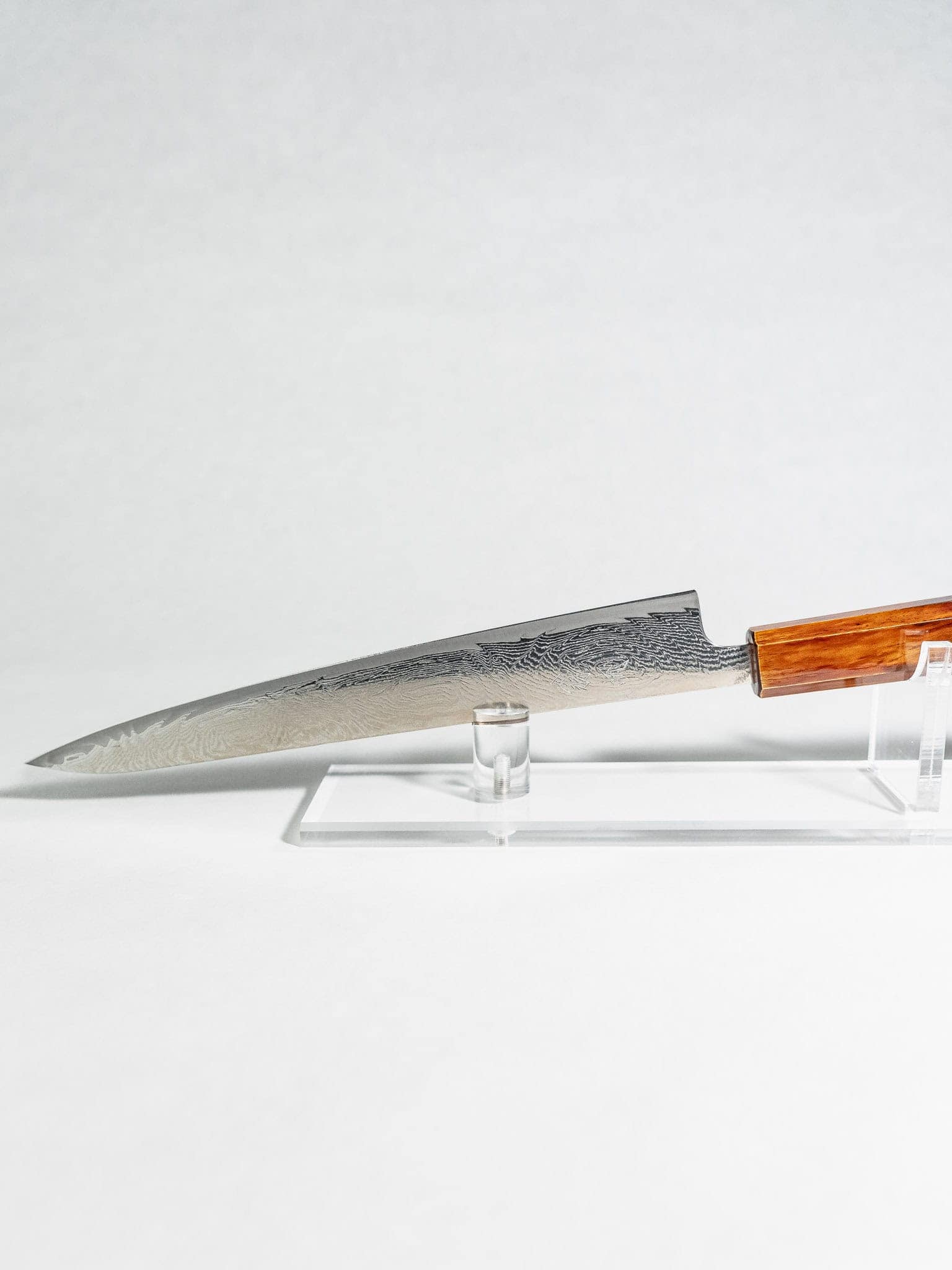 Twisted Uzu Damascus pattern detail on OUL Gyuto