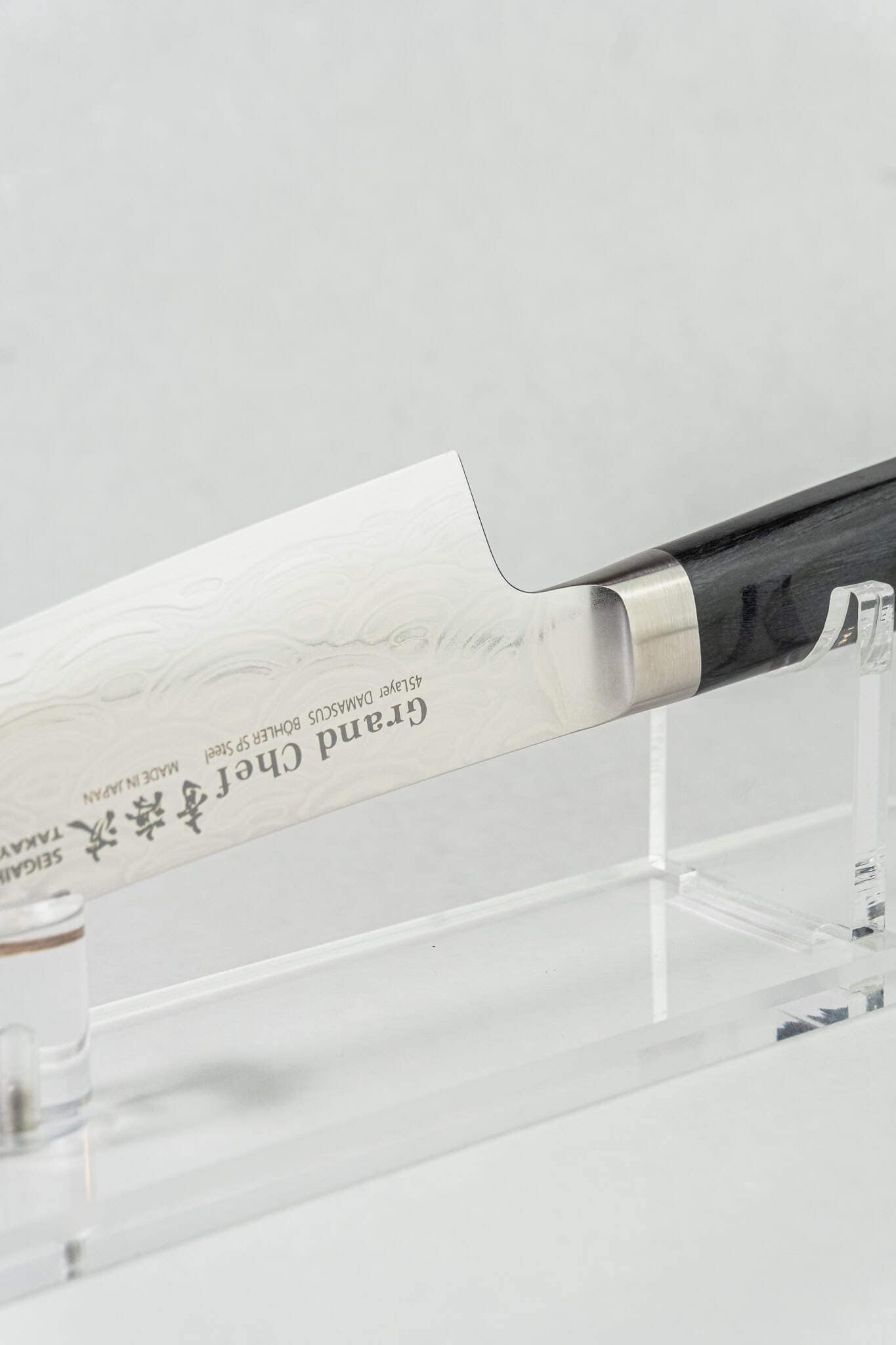 Sakai Takayuki chef knife with 'Grand Chef' branding on a white background