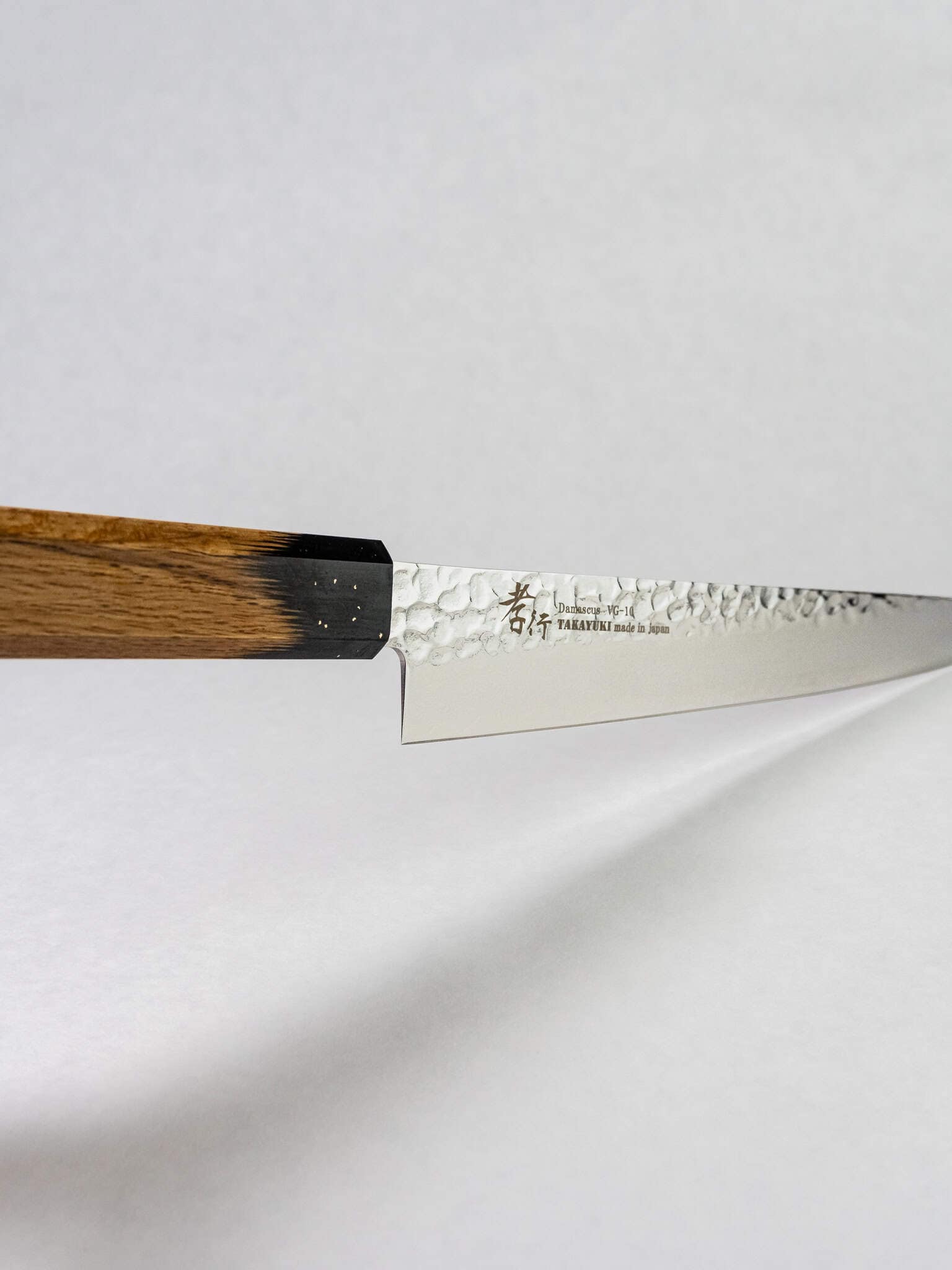 Texture detail of hammered stainless cladding