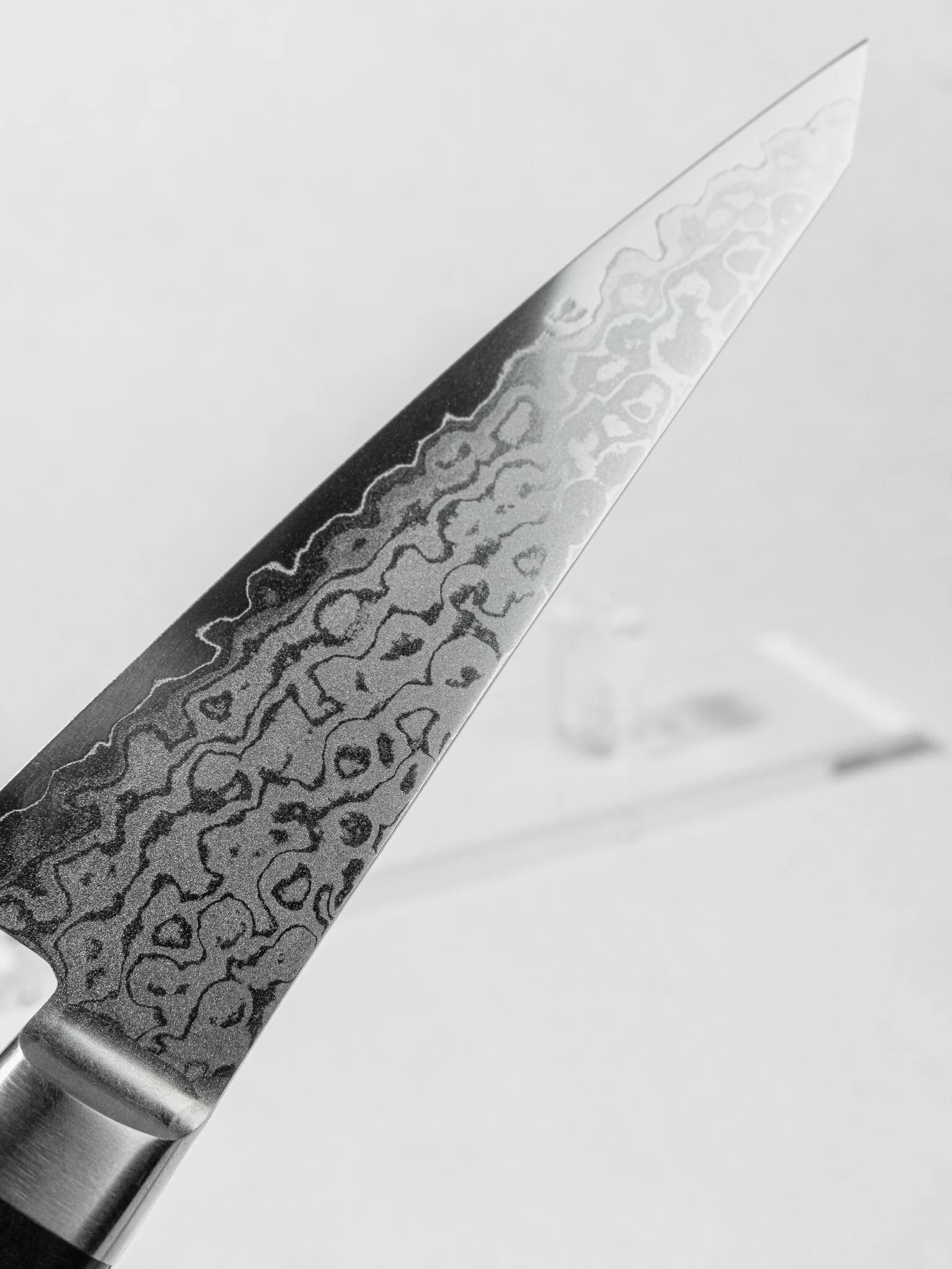 Damascus clad Honesuki blade layered pattern detail