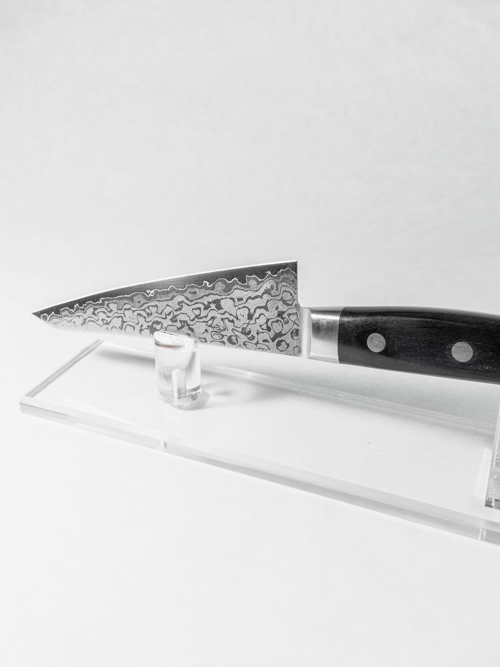 Stainless Damascus Japanese boning knife. San mai construction VG-10 Honesuki blade.
