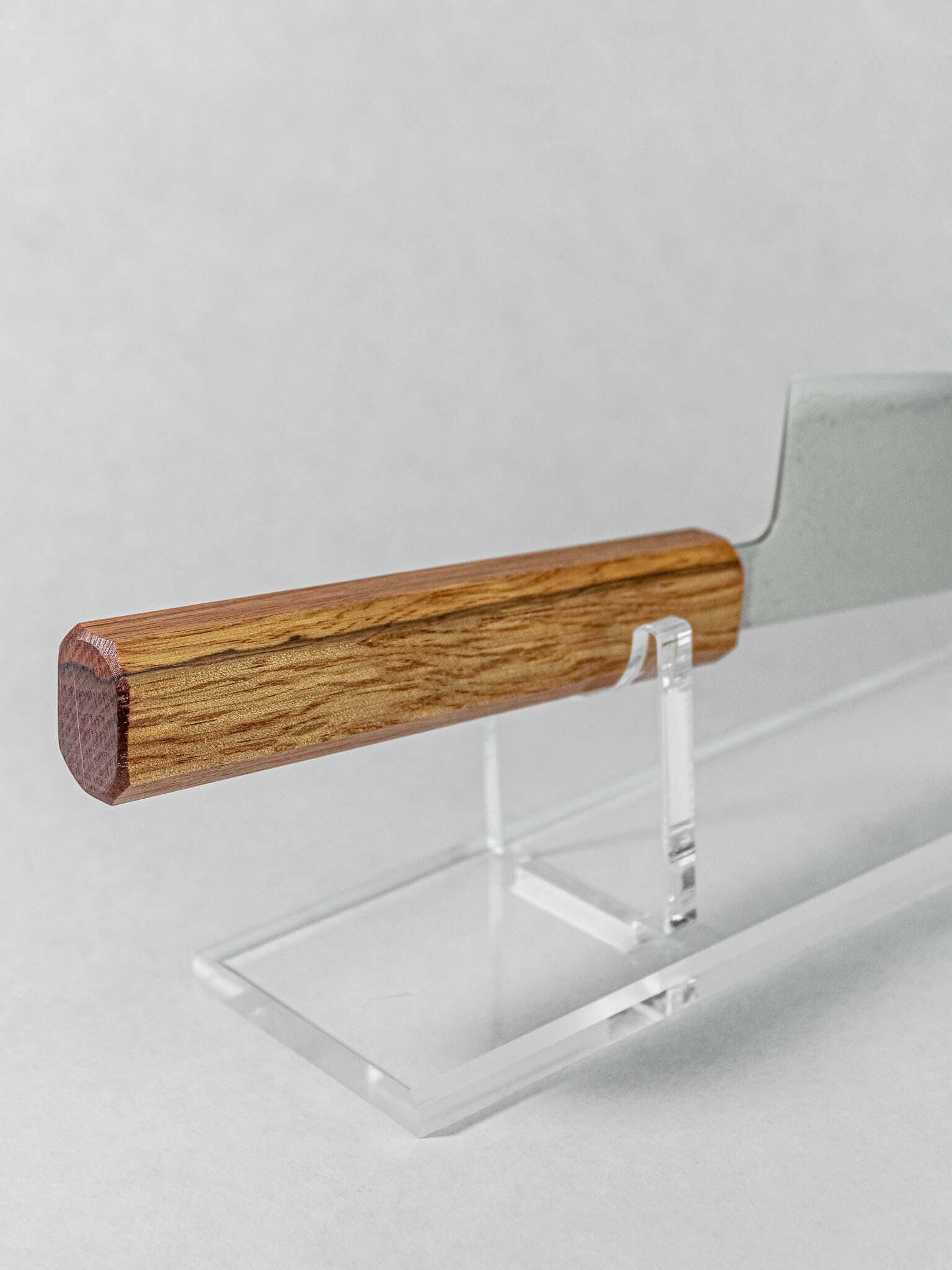 Natural oak wood grain handle detail