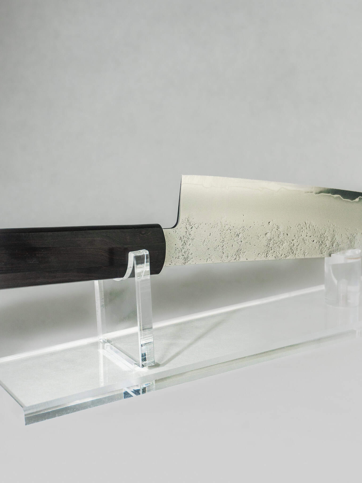 Close-up of Gyuto edge sharpness and nashiji stainless cladding