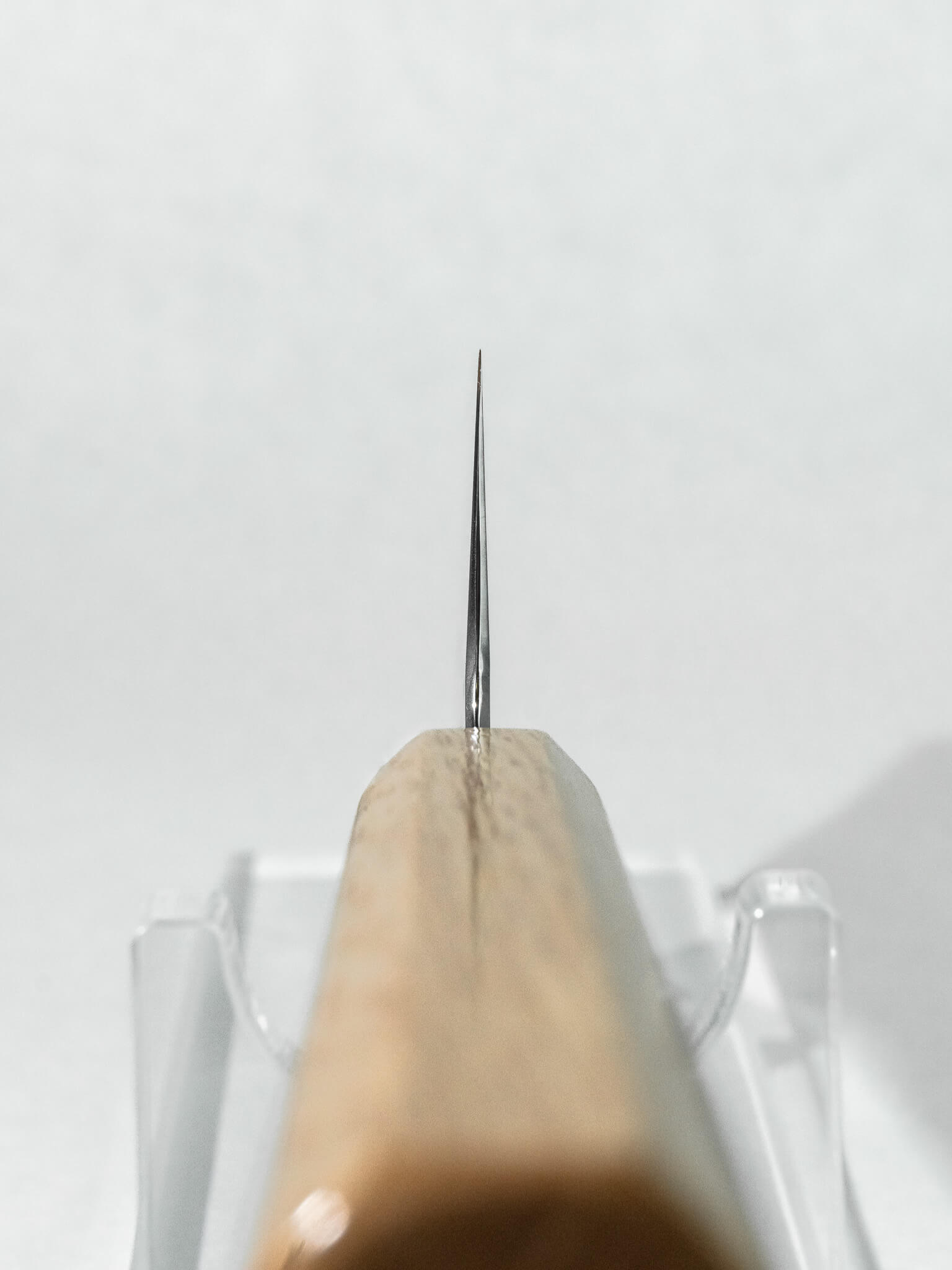 Choil view showing thin grind and balance of HADO bunka knife