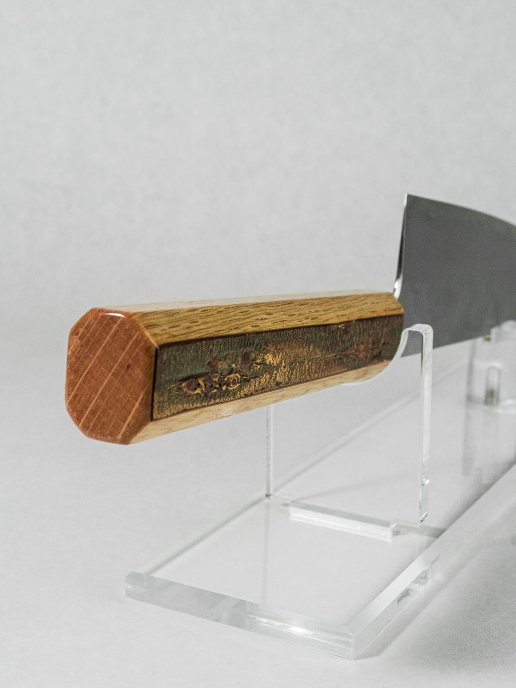 Close up of lacquered cherry bark handle with natural texture and grain