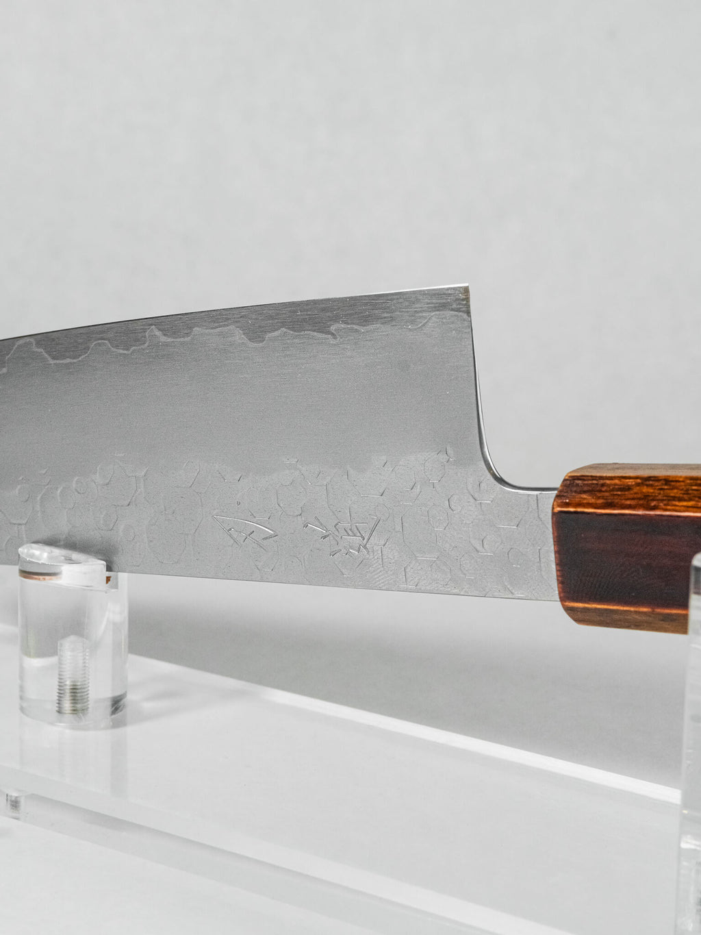 Close-up of oak handle texture and polished lacquer finish