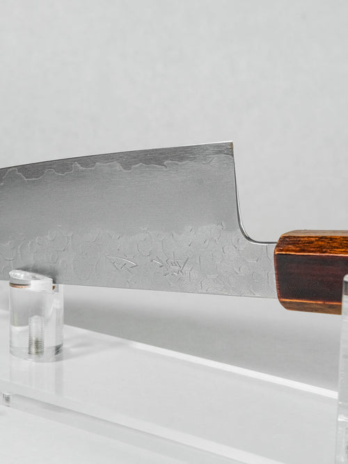 Close-up of oak handle texture and polished lacquer finish