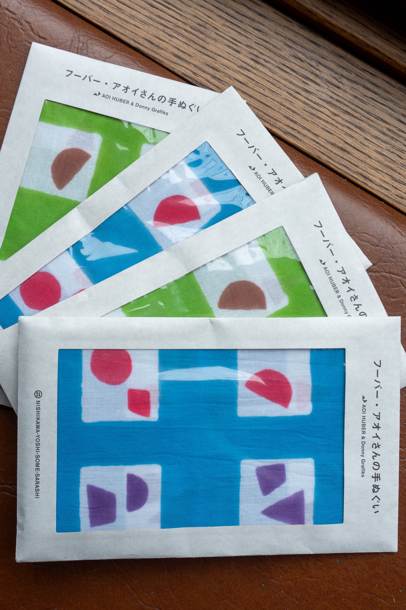 Traditional Japanese cotton Tenugui towel with artistic design