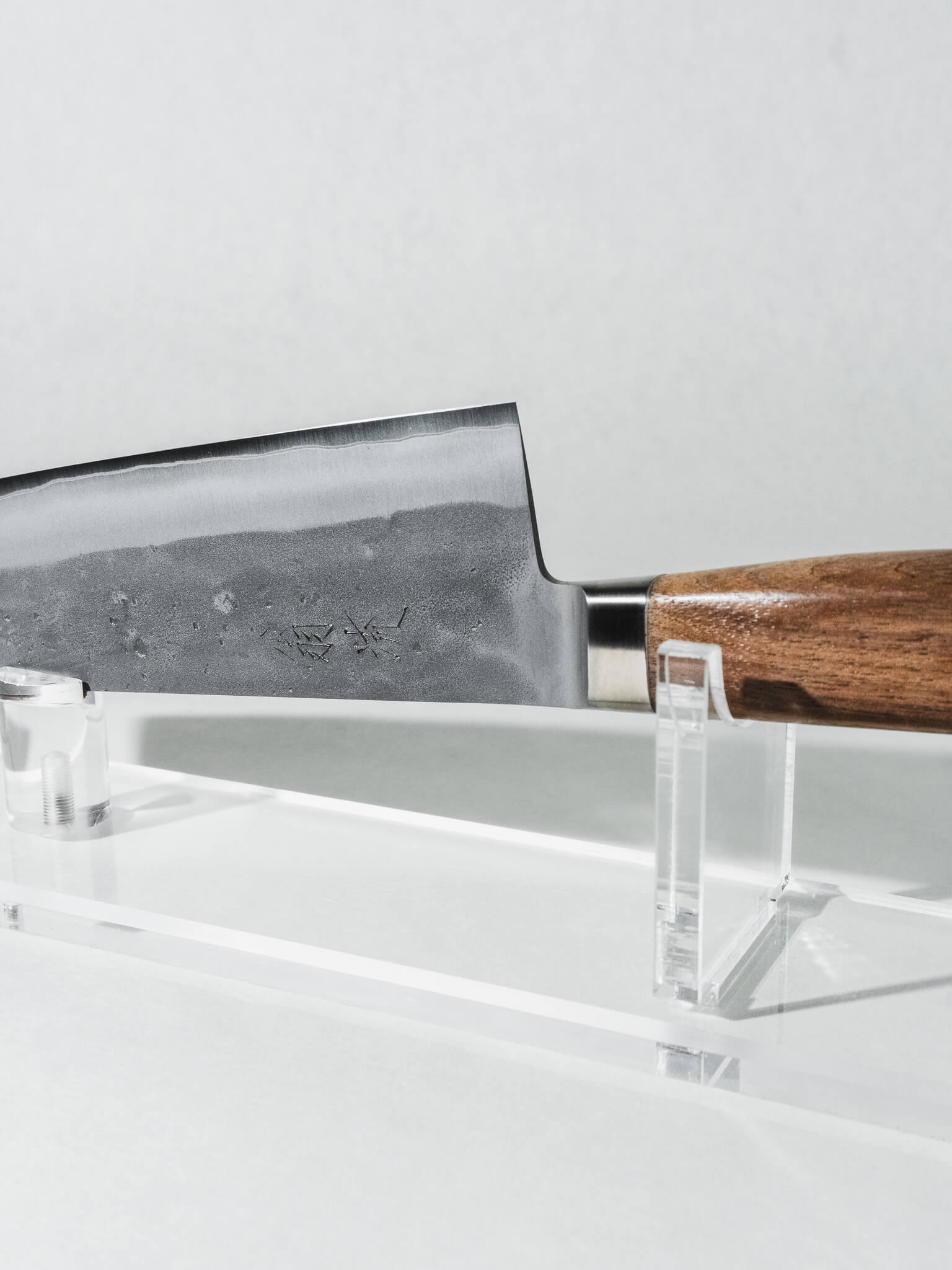 Integrated bolster and walnut handle close-up