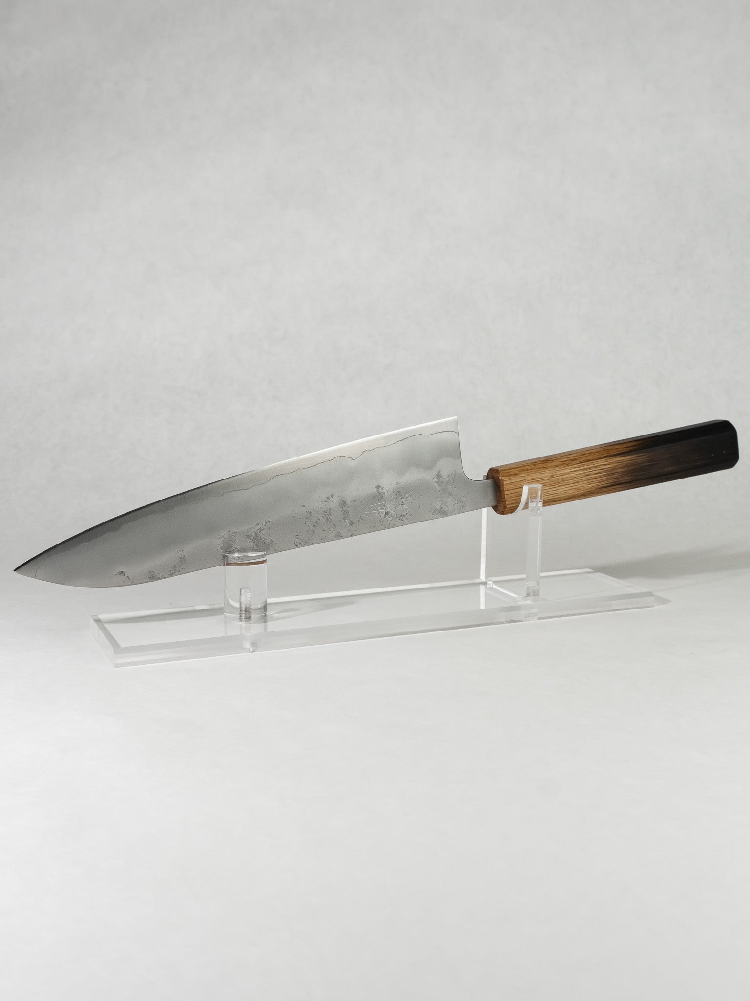 OUL 210mm Gyuto knife with Ginsan stainless steel core, nashiji finish, and octagonal burnt oak handle.