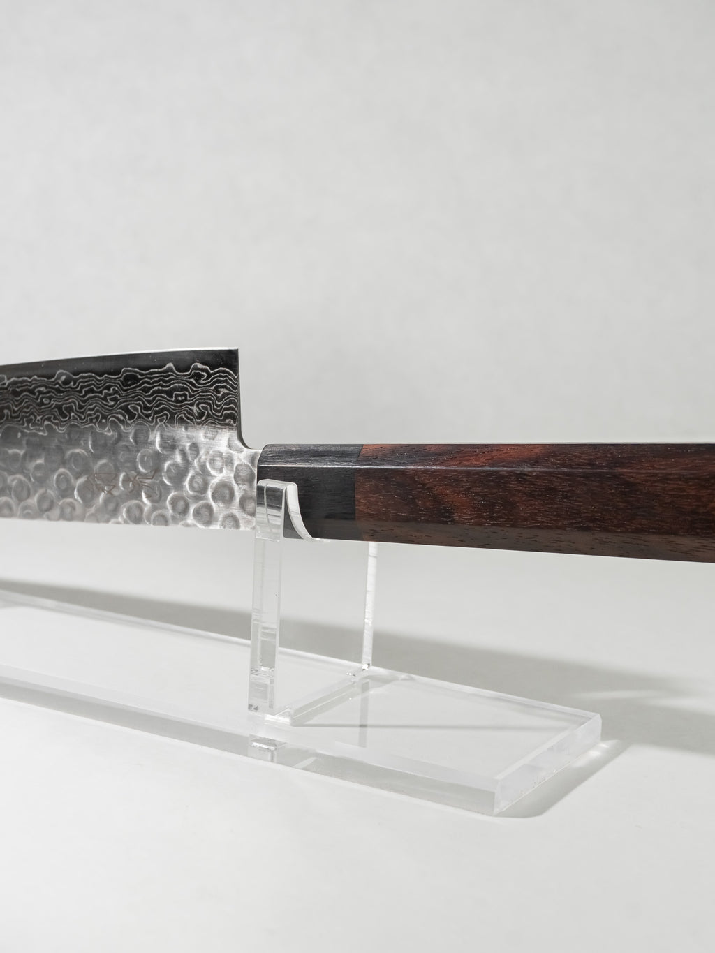 Balance detail highlighting the lightweight, nimble feel of the 210mm Gyuto for all-purpose kitchen work.