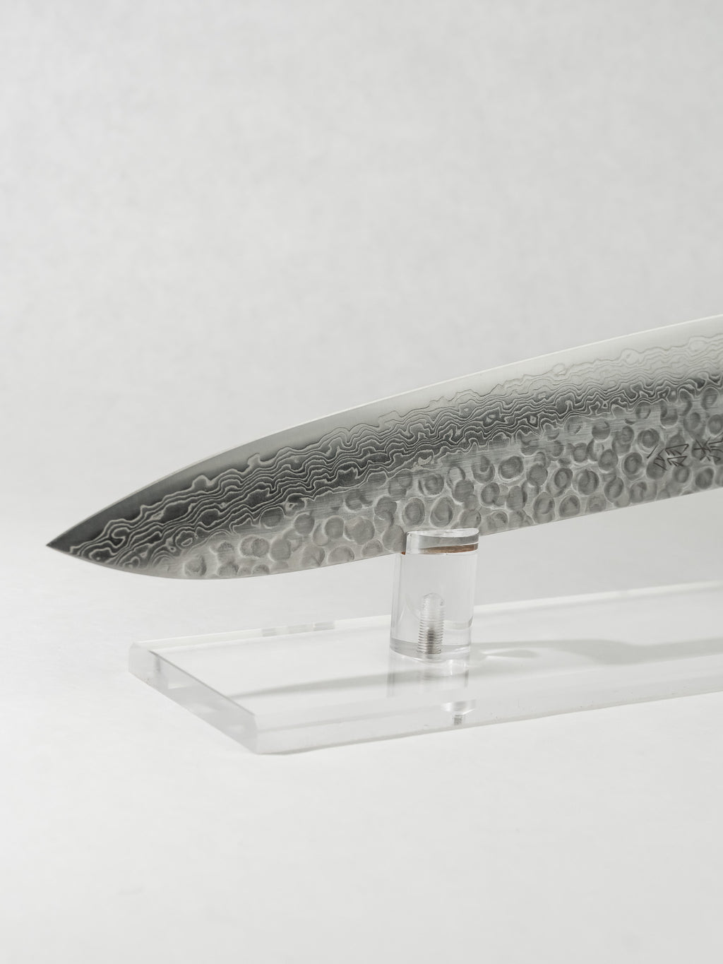 Side profile of OUL 210mm Gyuto showing versatile proportions and clean blade geometry.