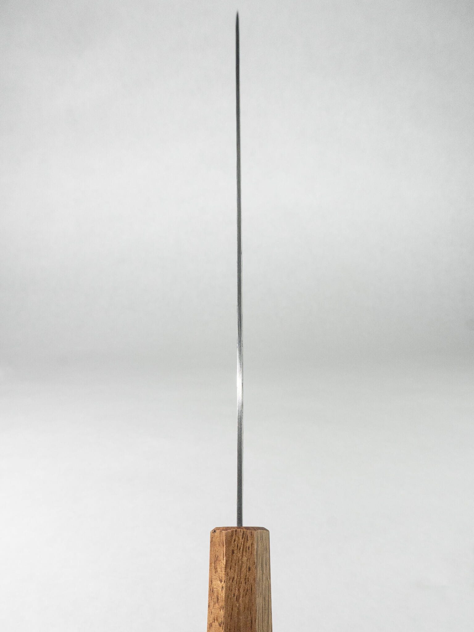 Spine detail showing slim blade thickness and balance