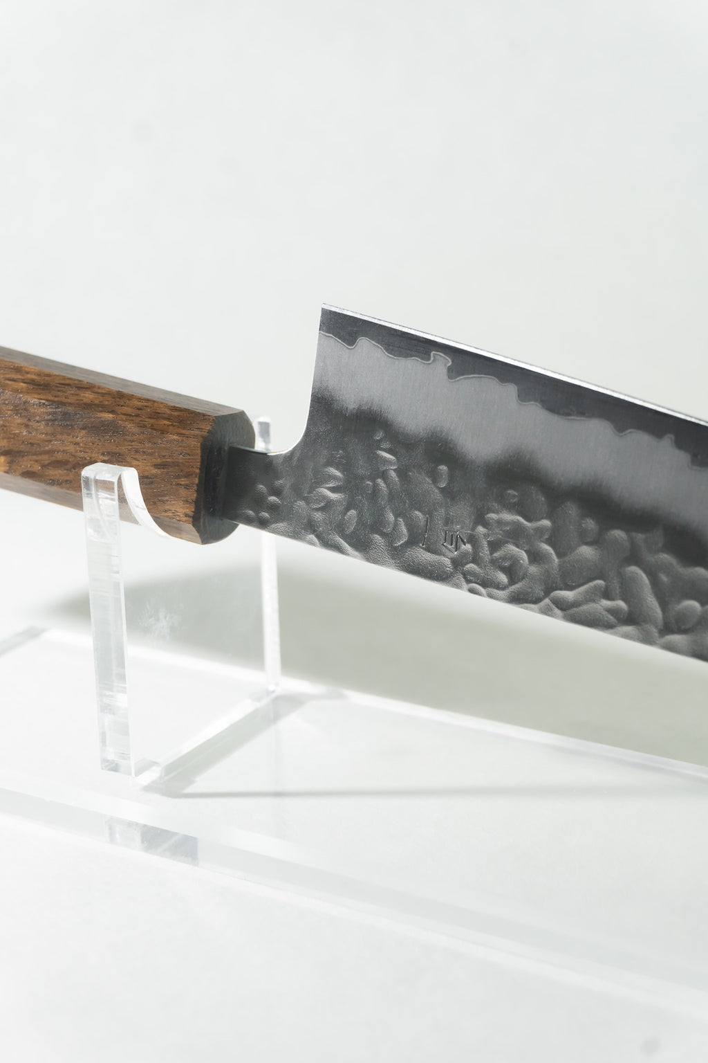 Detail of hand-hammered tsuchime texture for smooth food release.