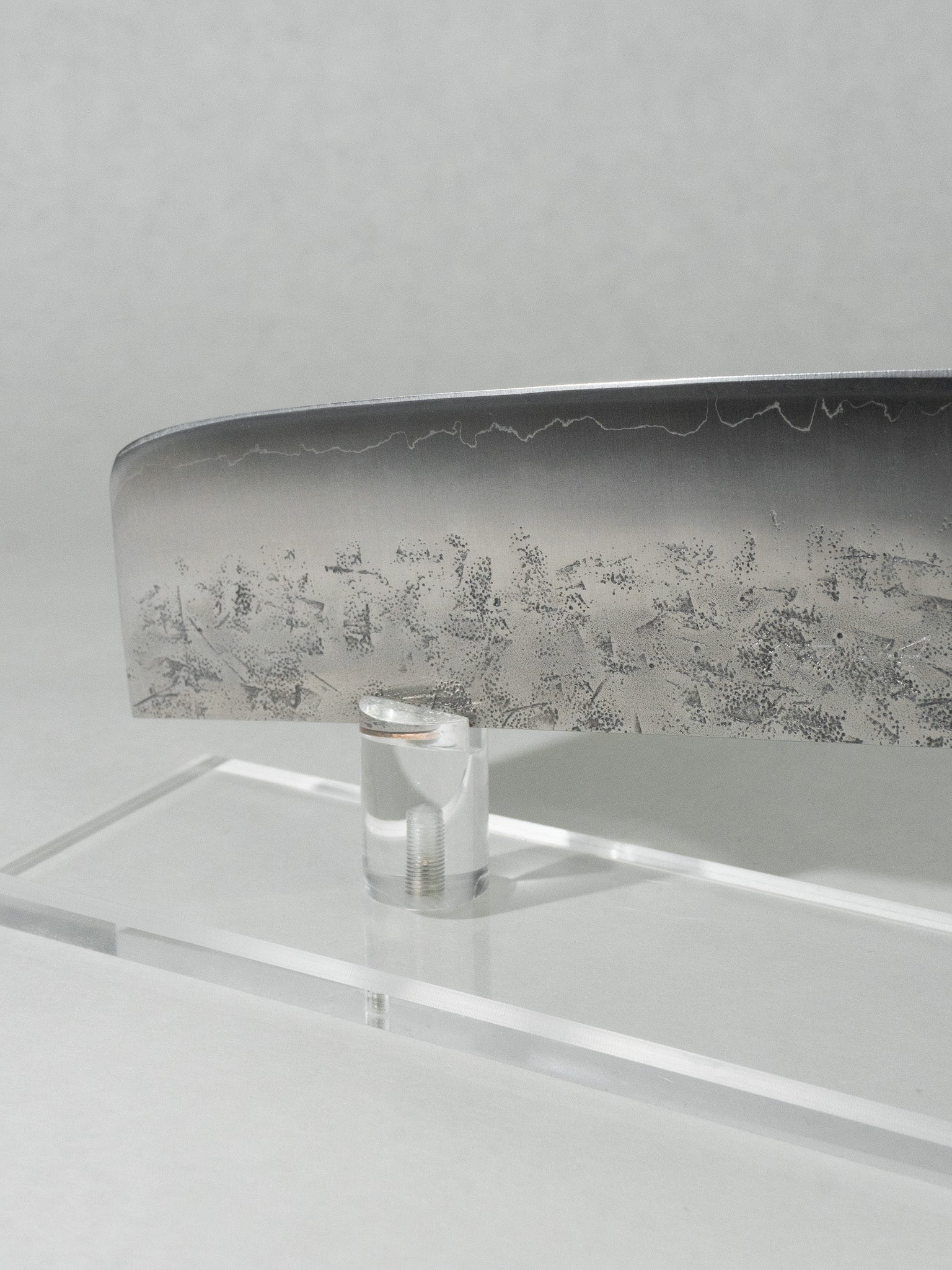 Detail of the Nakiri blade tip showing the thin grind designed for effortless vegetable slicing.