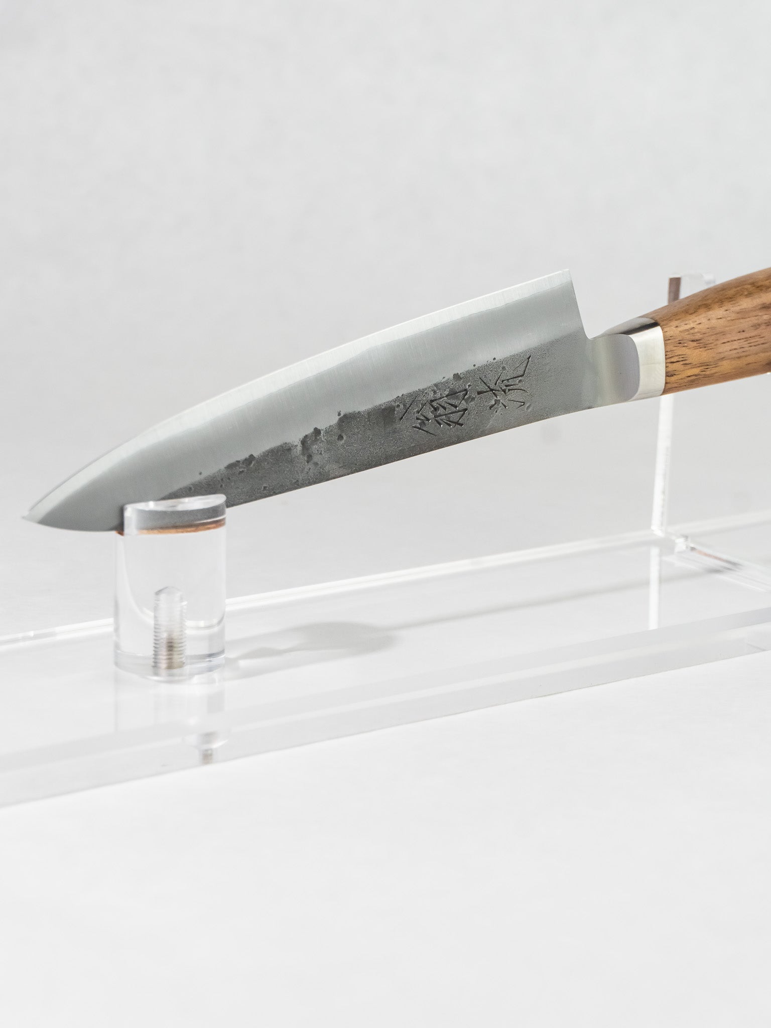 Side profile of OUL 125mm petty knife showing full blade, nashiji finish, and walnut handle.