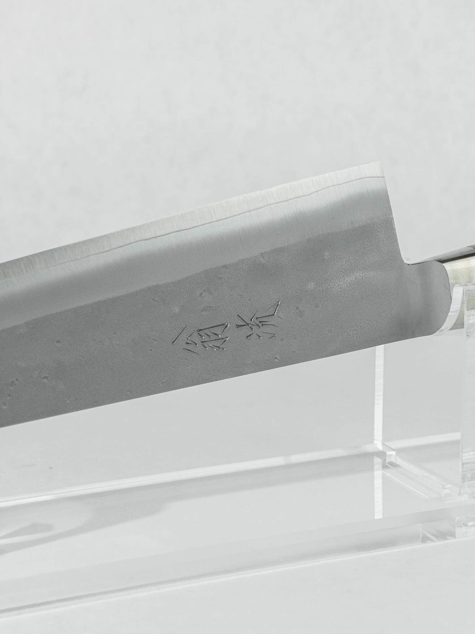 Nashiji pear-skin finish detail on OUL Kiritsuke blade.