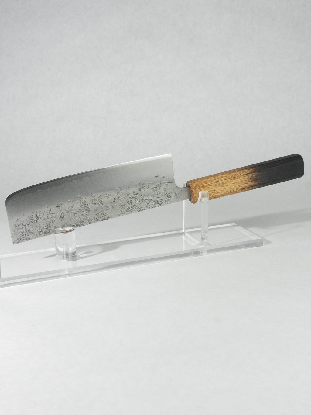 OUL 165mm Nakiri knife featuring SLD steel core with stainless nashiji cladding and octagonal burnt oak handle.