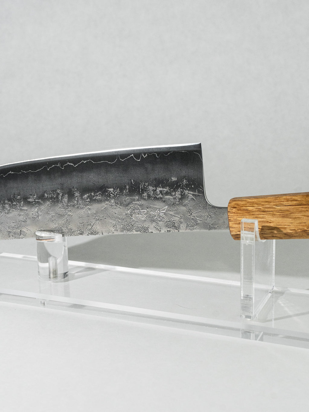 Profile view of the 165mm Nakiri highlighting its lightweight, well-balanced design and the smooth choil area for a comfortable pinch grip.