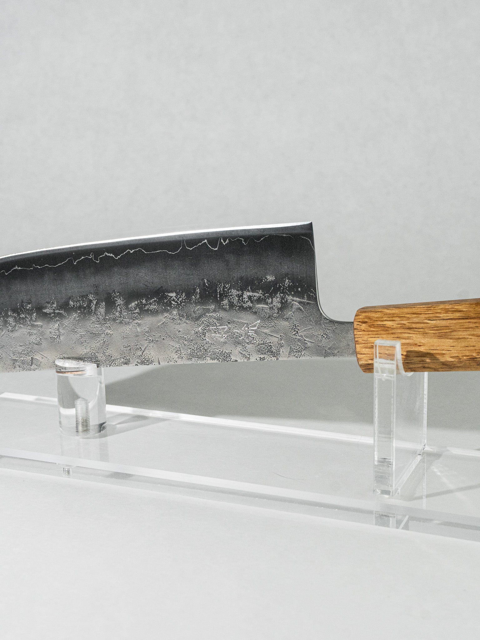 Profile view of the 165mm Nakiri highlighting its lightweight, well-balanced design and the smooth choil area for a comfortable pinch grip.