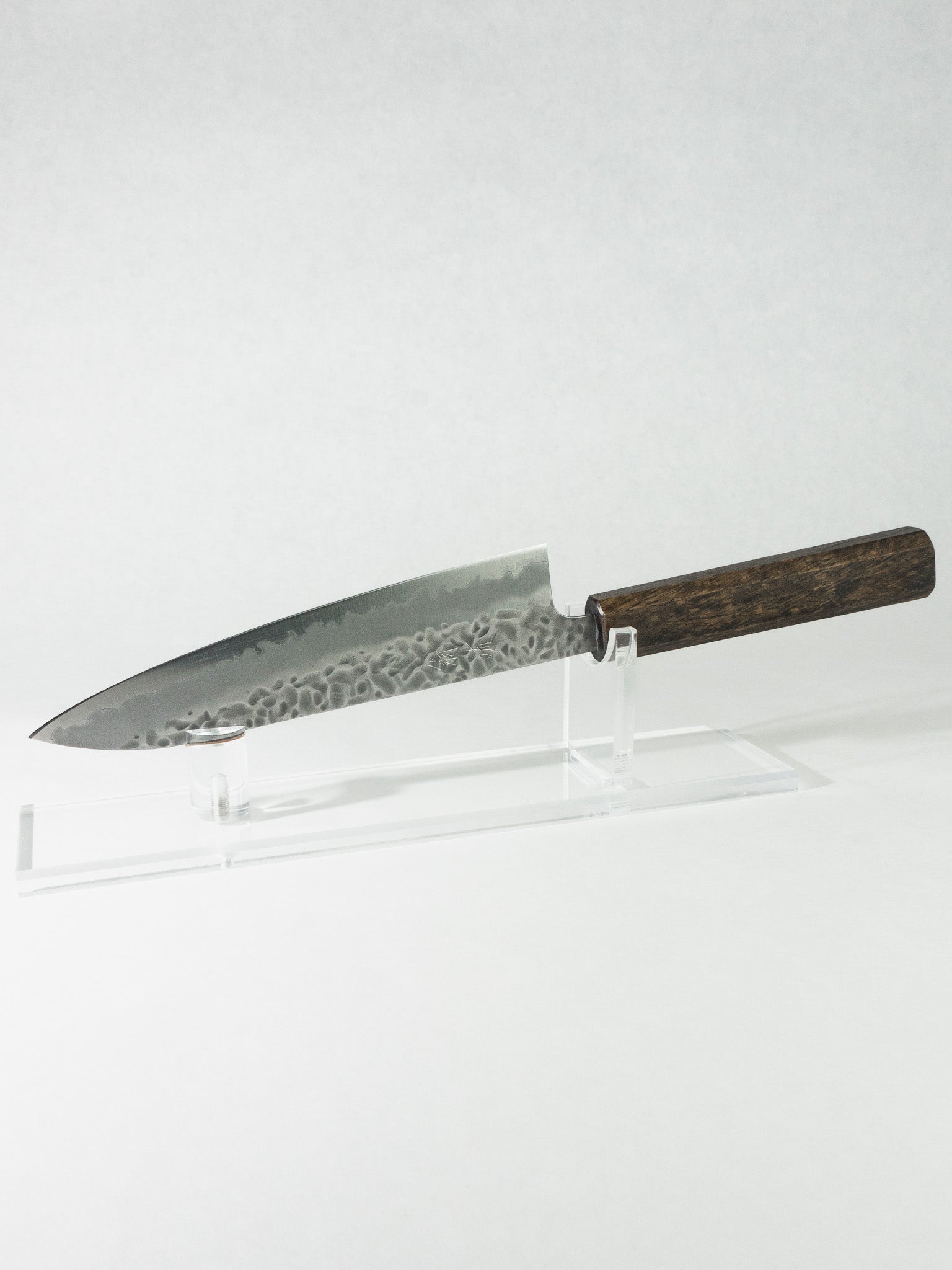 OUL 180mm Gyuto knife with White #1 (Shirogami #1) steel core, hand-hammered tsuchime blade, and octagonal darkened oak handle.