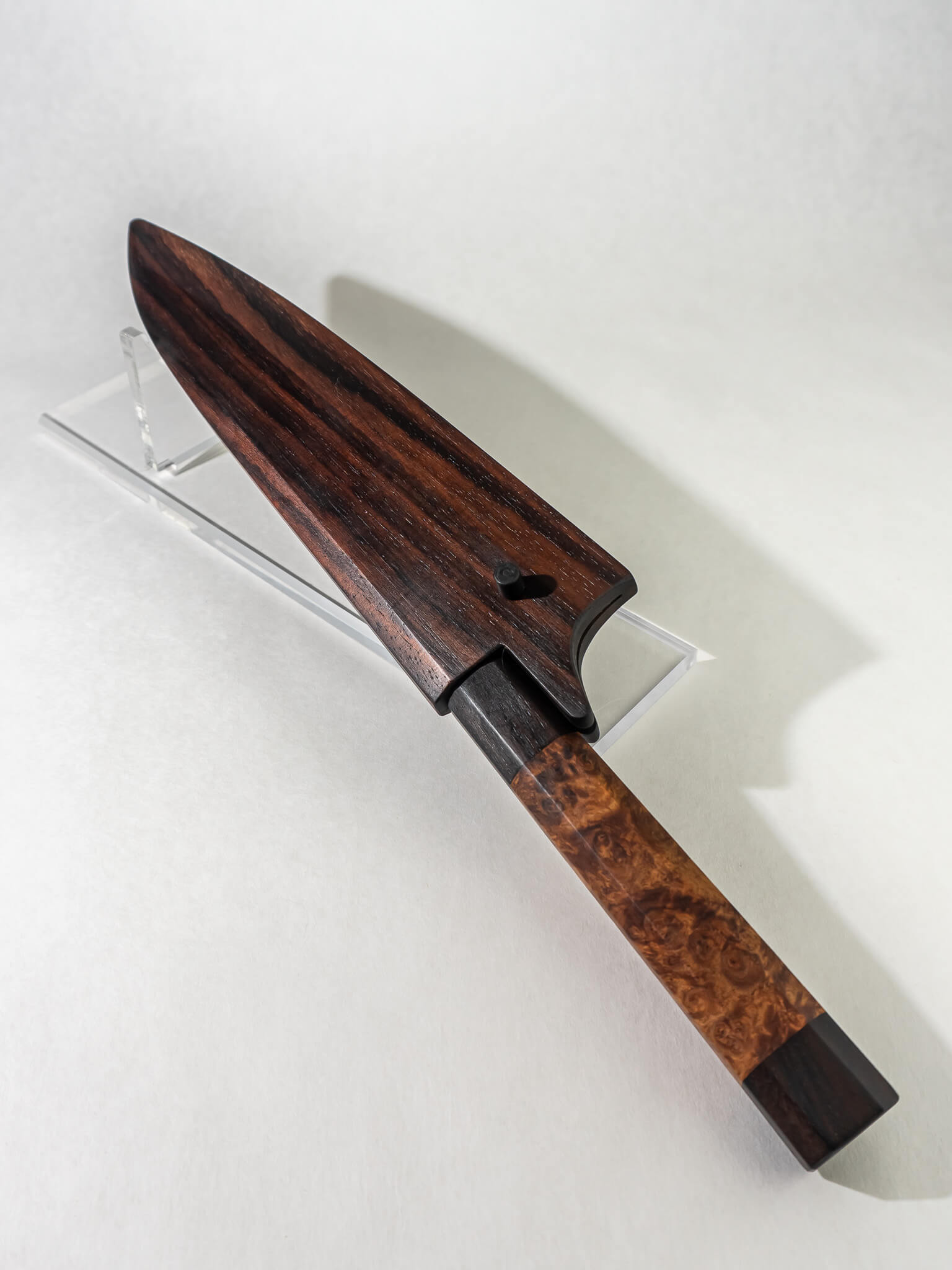Pisau Dapur gyuto knife 230mm featuring a sharp, well-balanced blade and a smooth rosewood handle, paired with a matching rosewood saya for safe storage and blade protection.