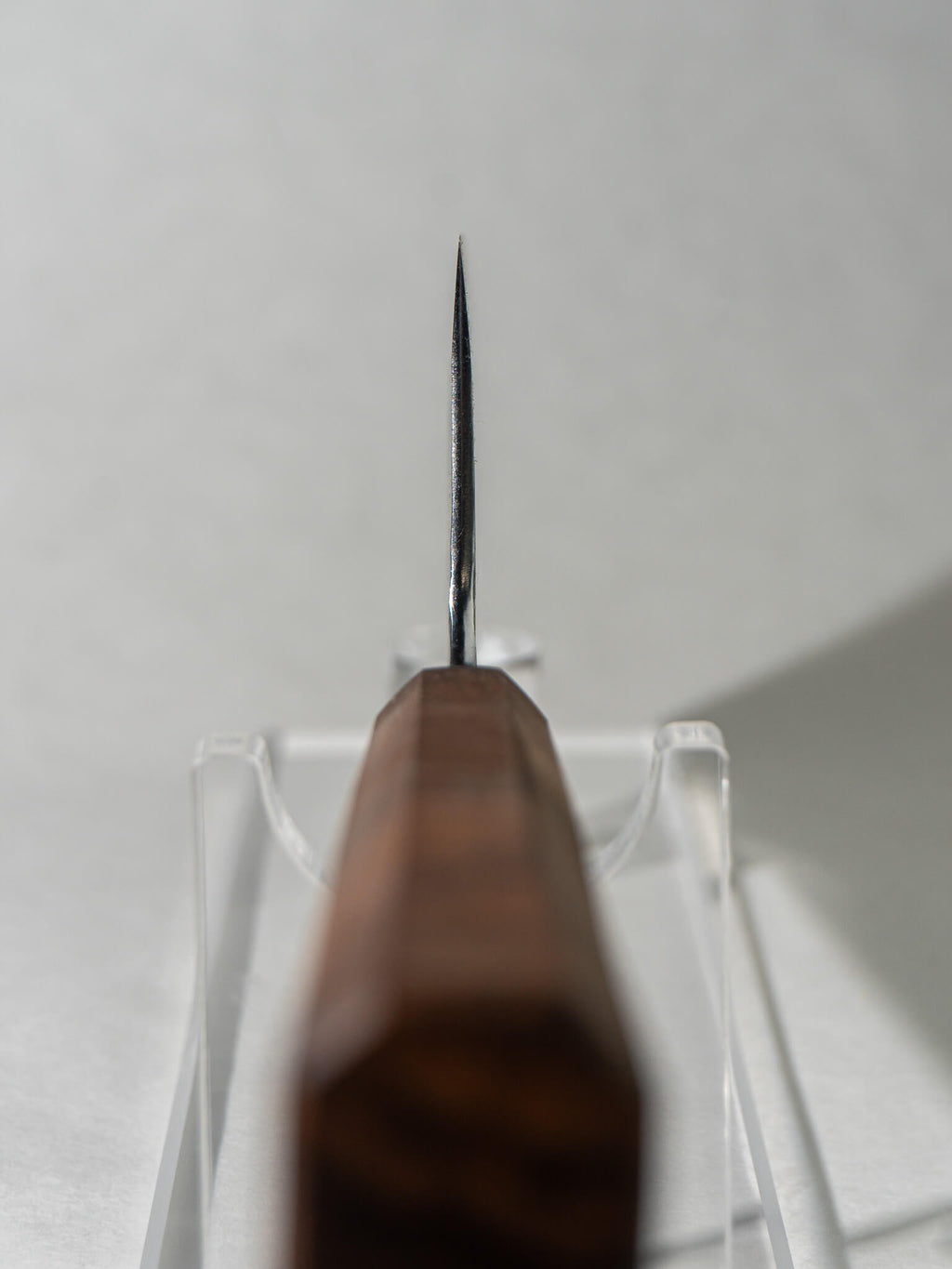 Choil and heel section of high-carbon leaf spring Nakiri, emphasizing precision and control in cutting.