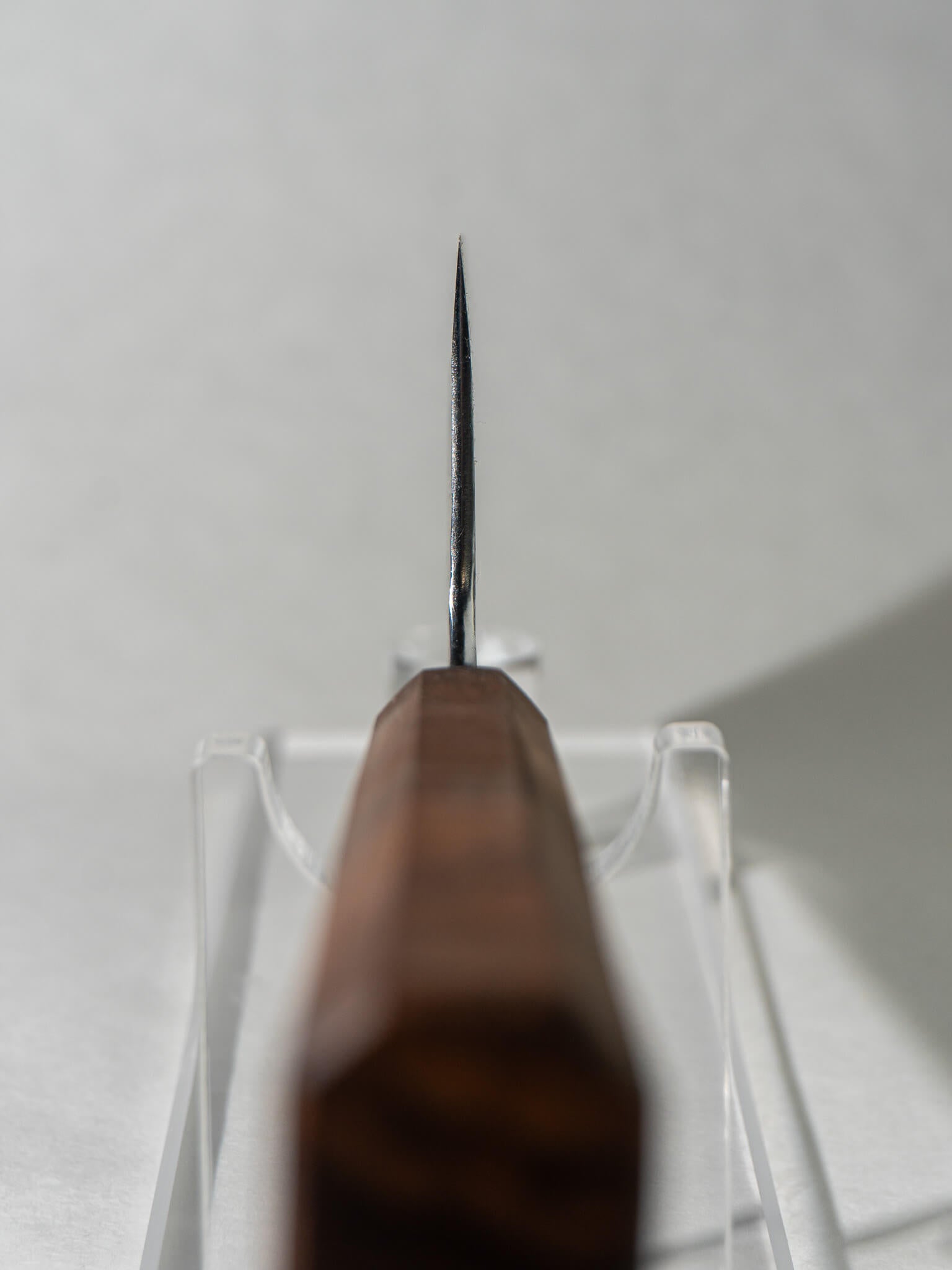 Choil and heel section of high-carbon leaf spring Nakiri, emphasizing precision and control in cutting.