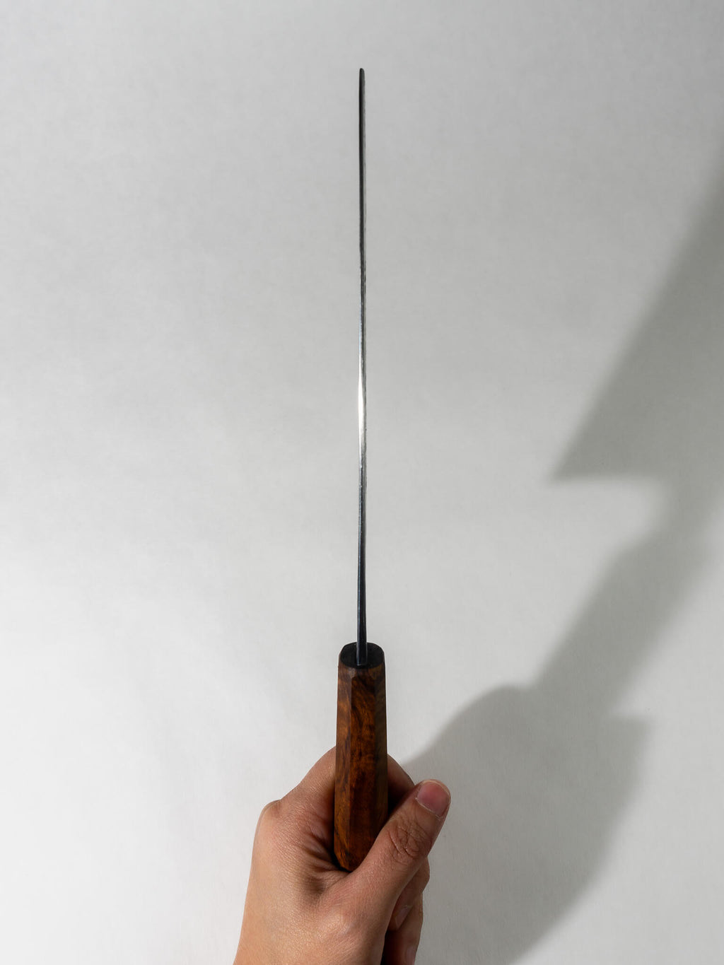 Top view of Pisau Dapur 180mm Nakiri knife highlighting the straight, sturdy blade spine for precise cutting control.