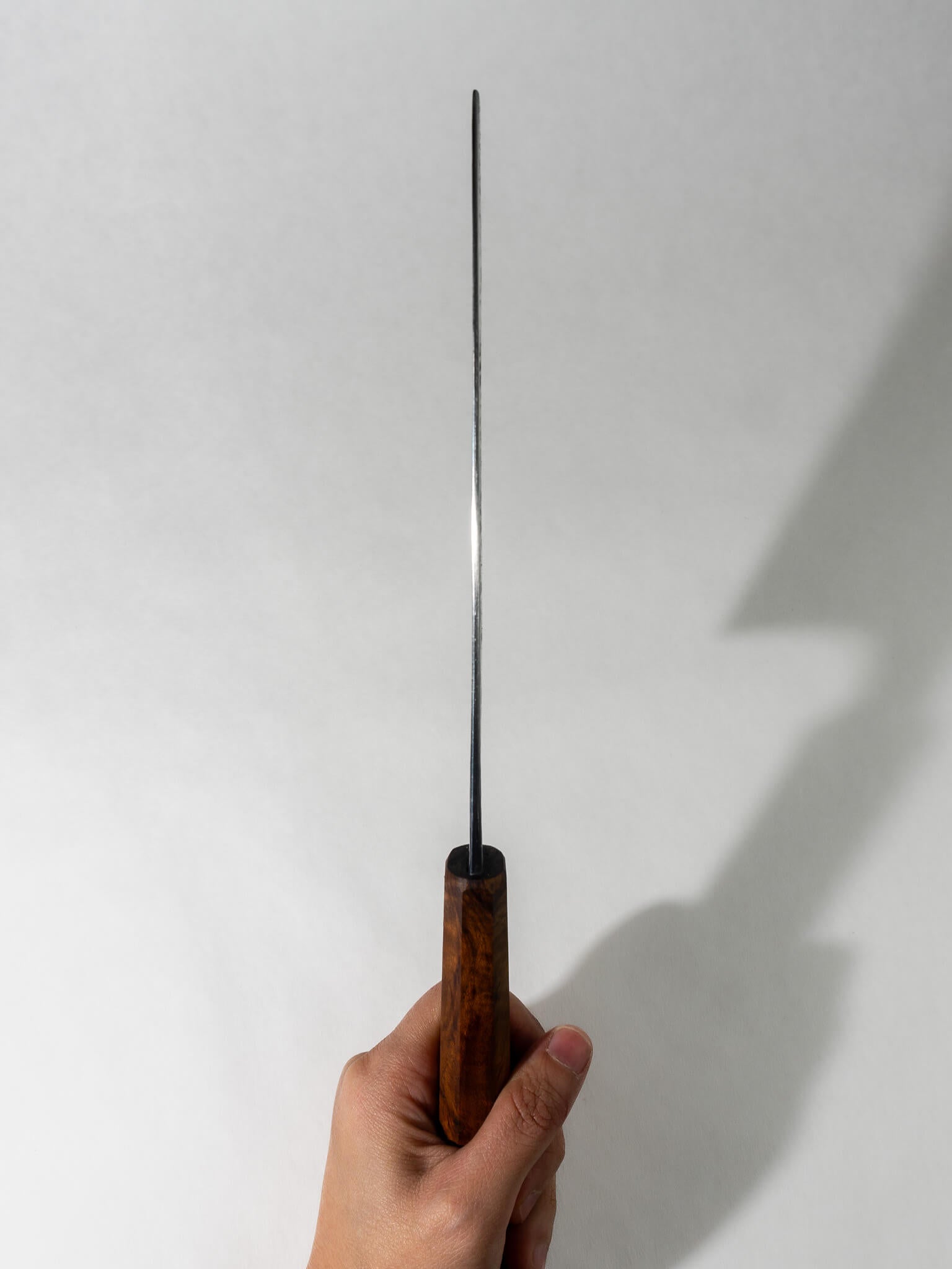 Top view of Pisau Dapur 180mm Nakiri knife highlighting the straight, sturdy blade spine for precise cutting control.