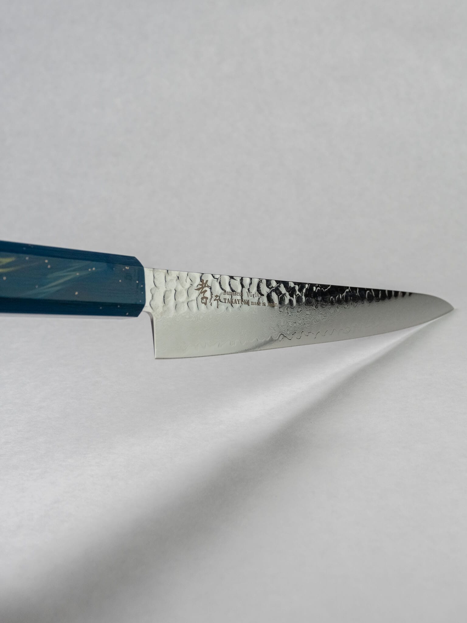 Texture detail of hammered stainless cladding