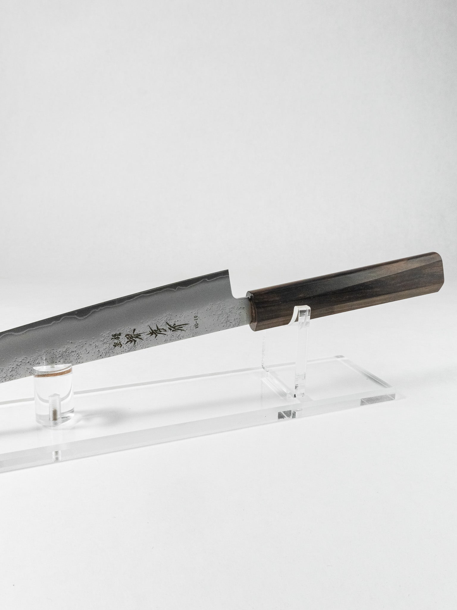 Side profile of Sakai Takayuki sujihiki knife showing long slender blade