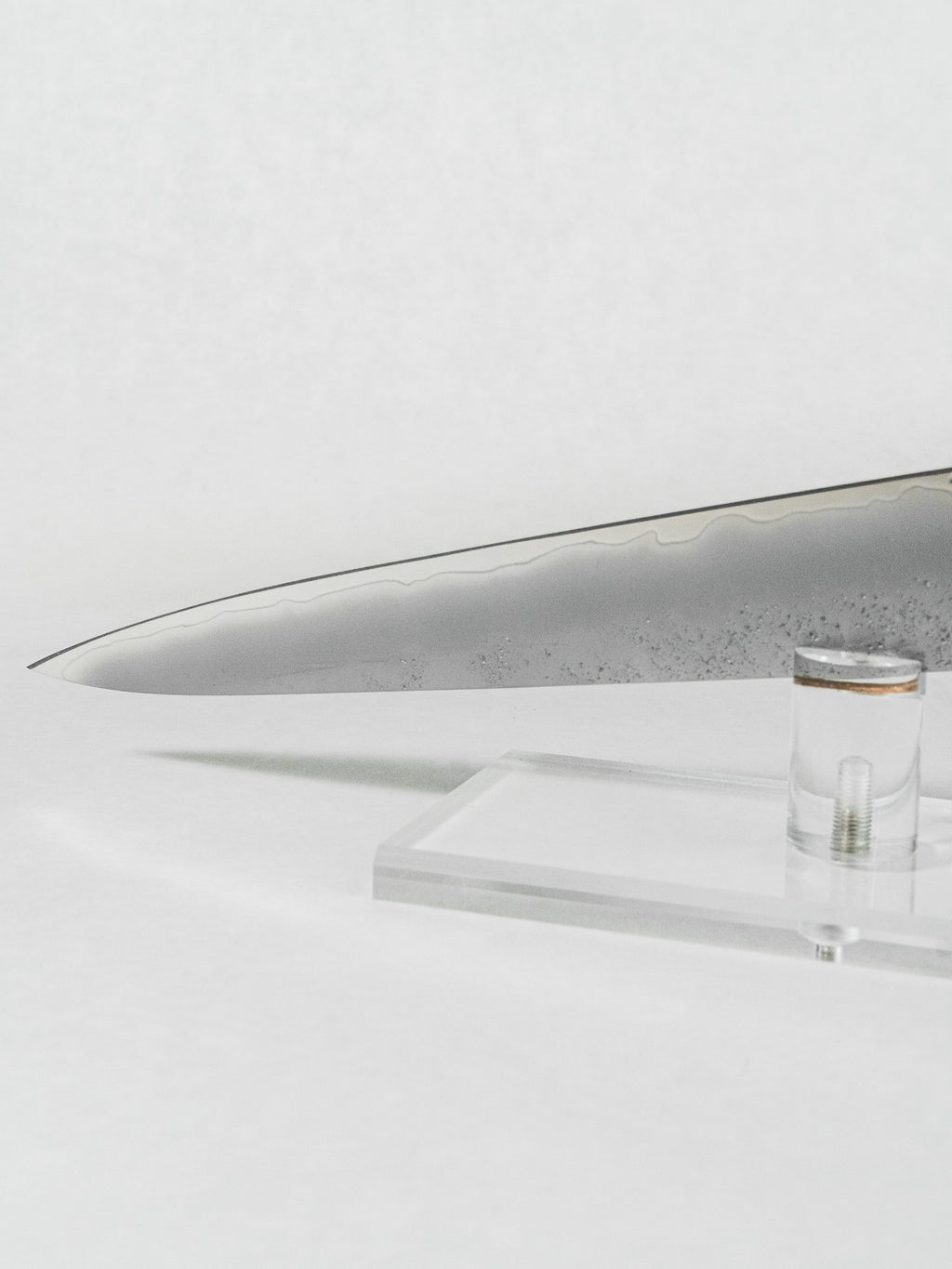 Tip of the Japanese sujihiki knife for slicing meat with clean precise cuts