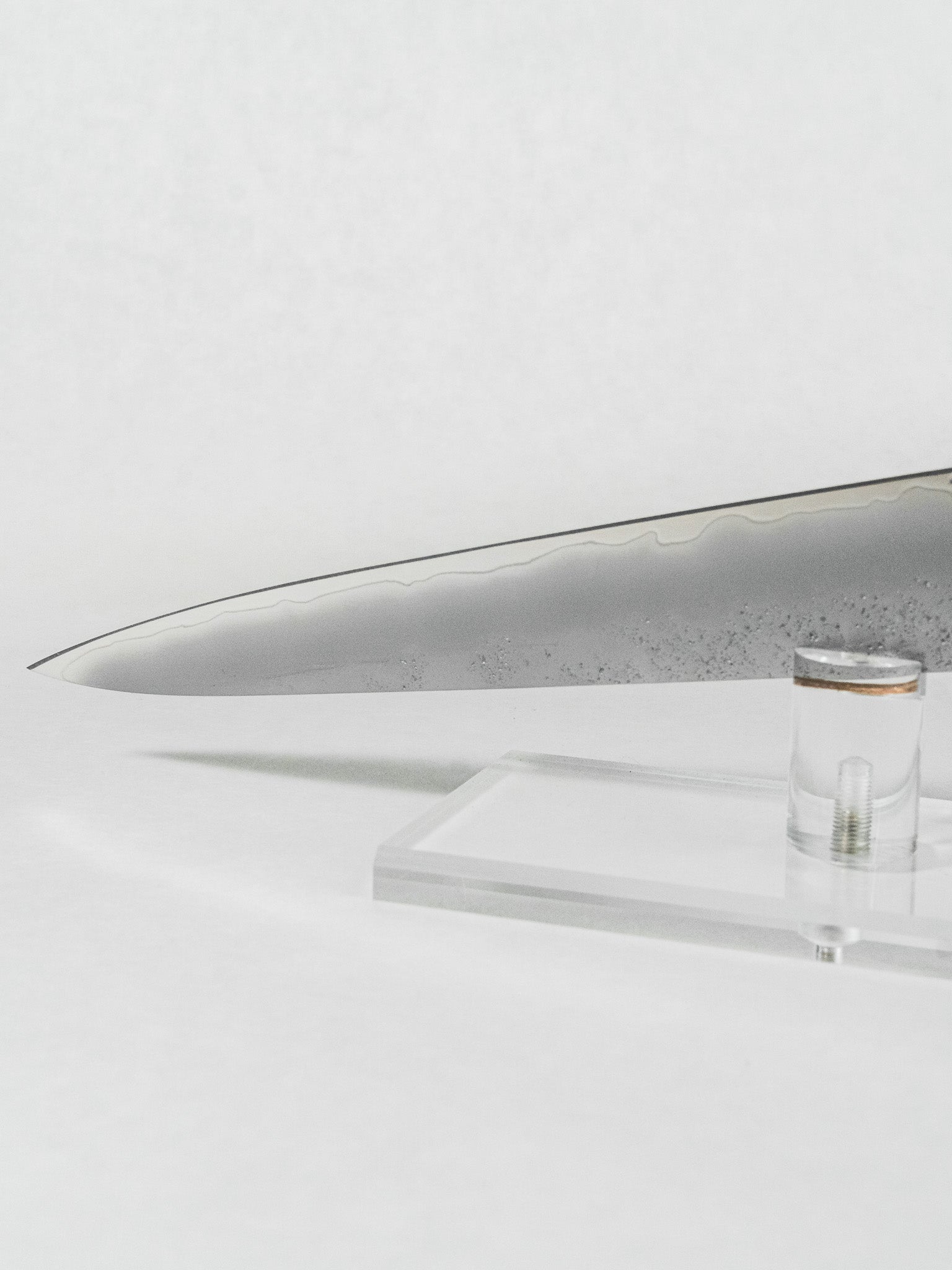 Tip of the Japanese sujihiki knife for slicing meat with clean precise cuts