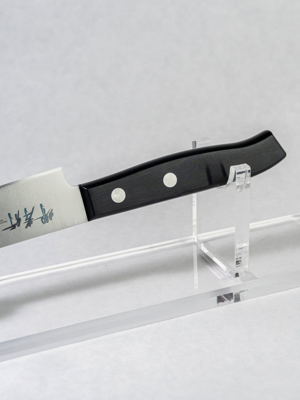 Black pakka wood handle on Sakai Takayuki petty