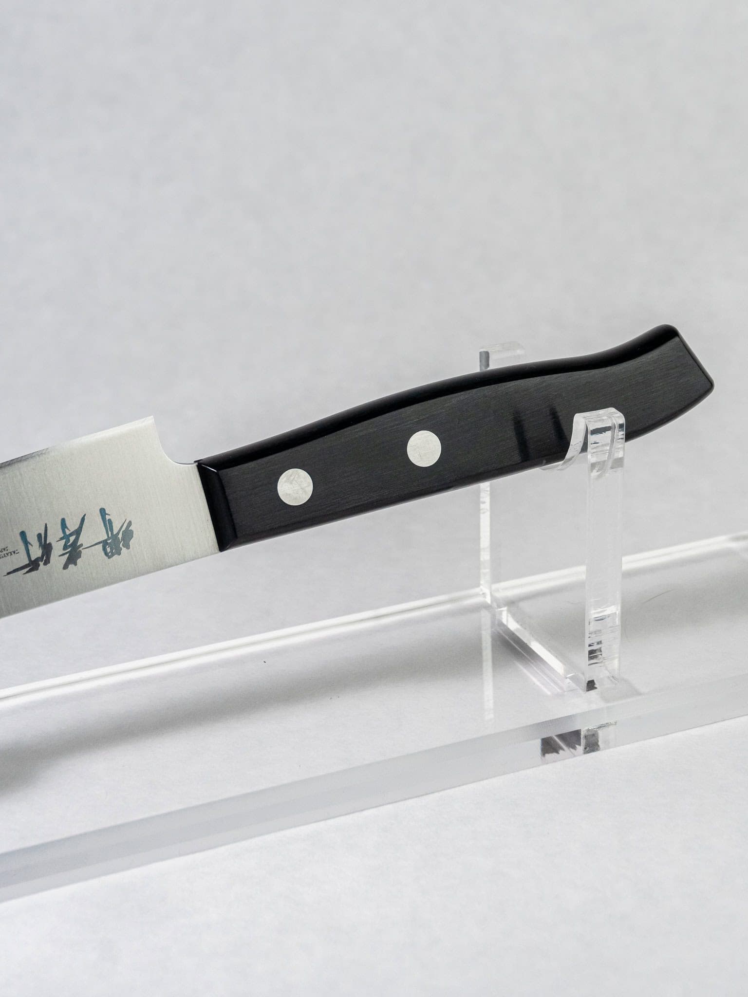 Black pakka wood handle on Sakai Takayuki petty