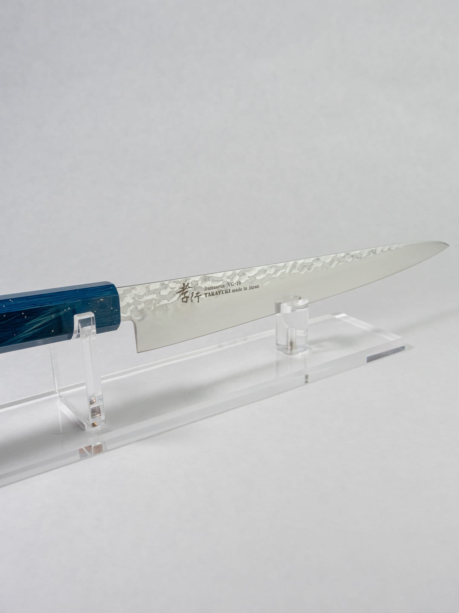 Side view showing long slender VG10 Sujihiki blade