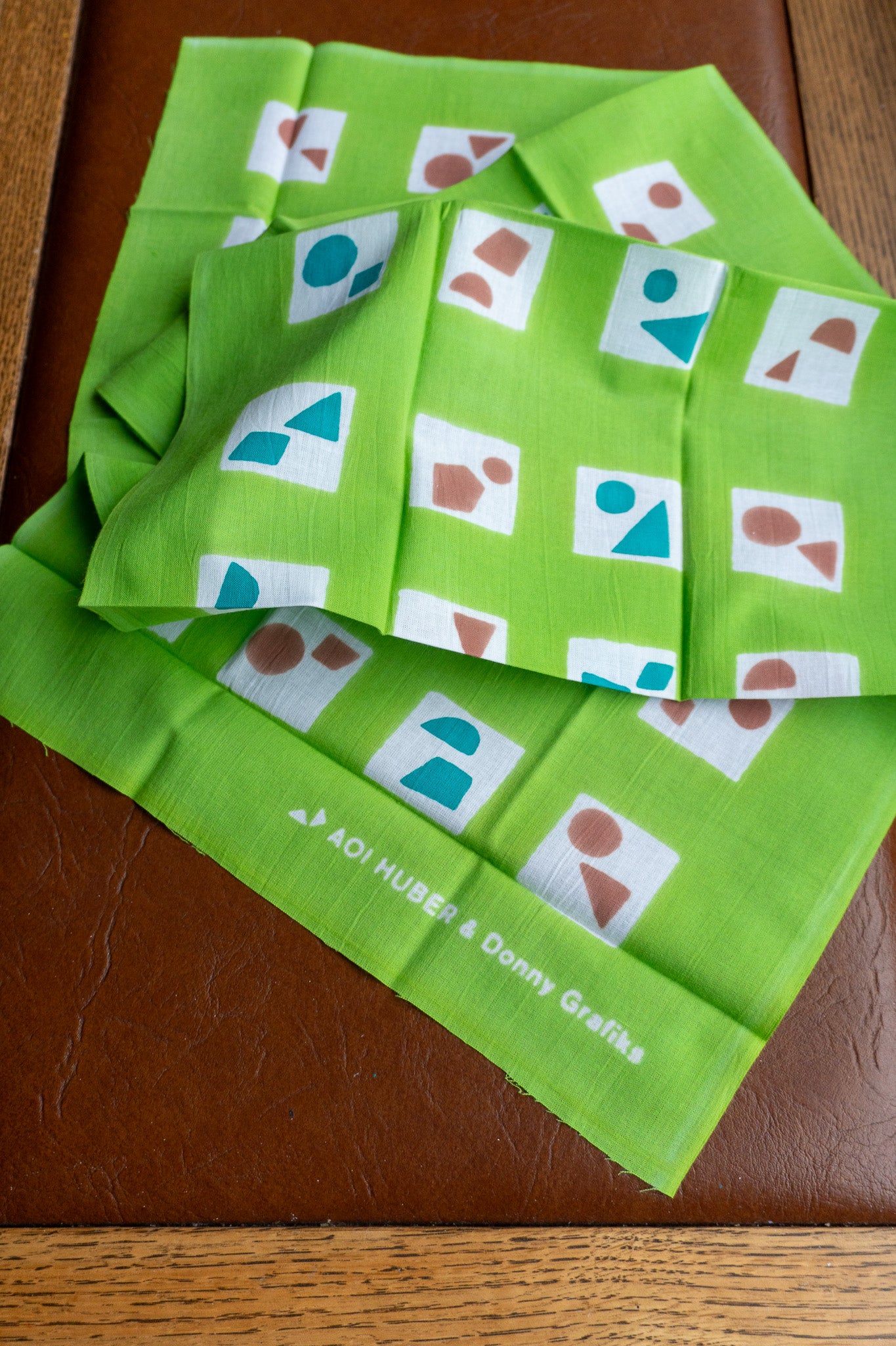 Tenugui towel draped over counter for practical kitchen use