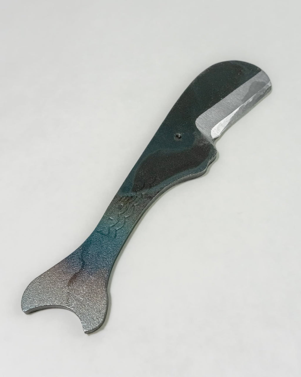 Close up of the tail on the whale-shaped knife by Toru Yamashita. 