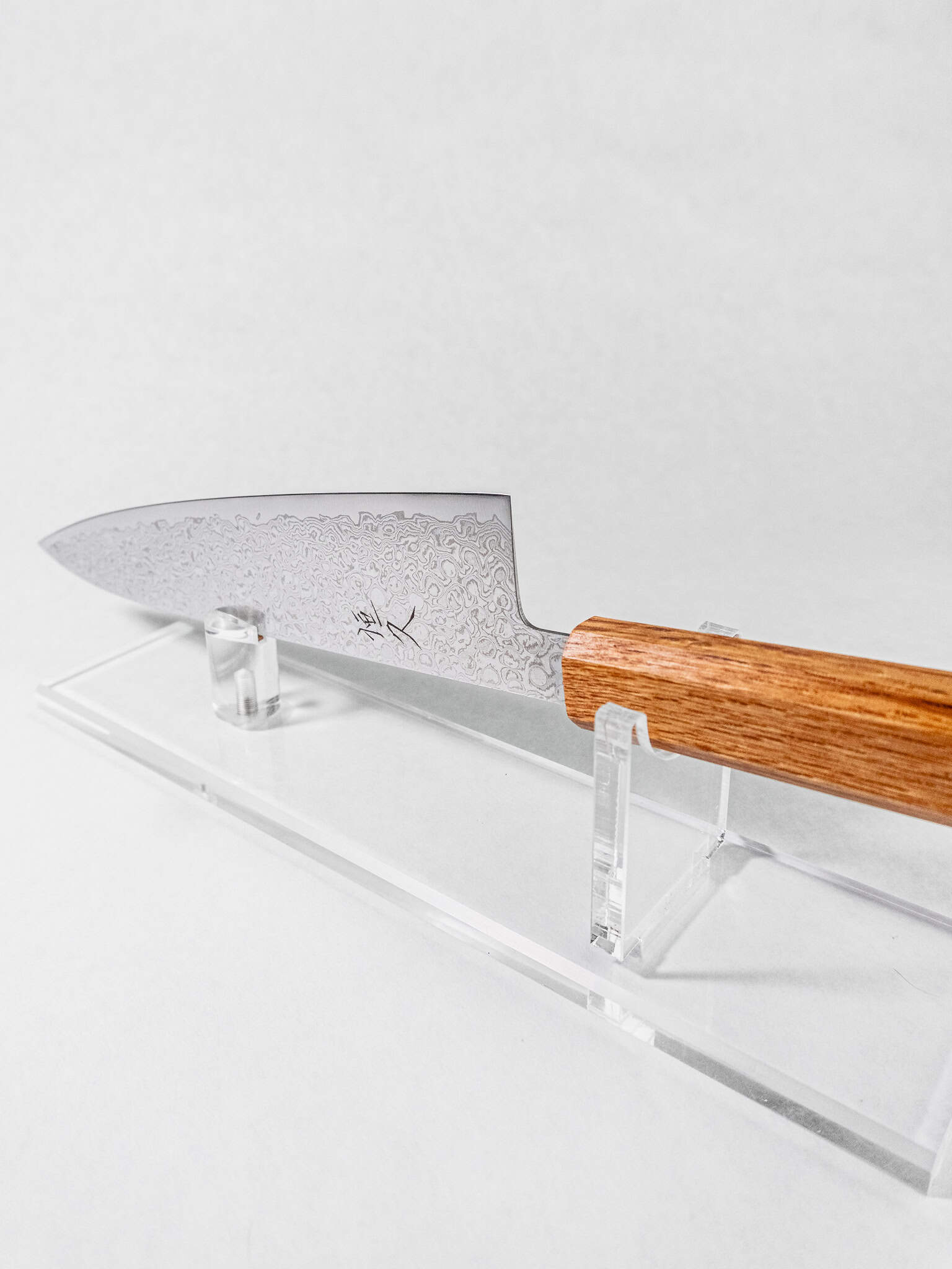 Tsunehisa ZA-18 gyuto knife used in kitchen prep
