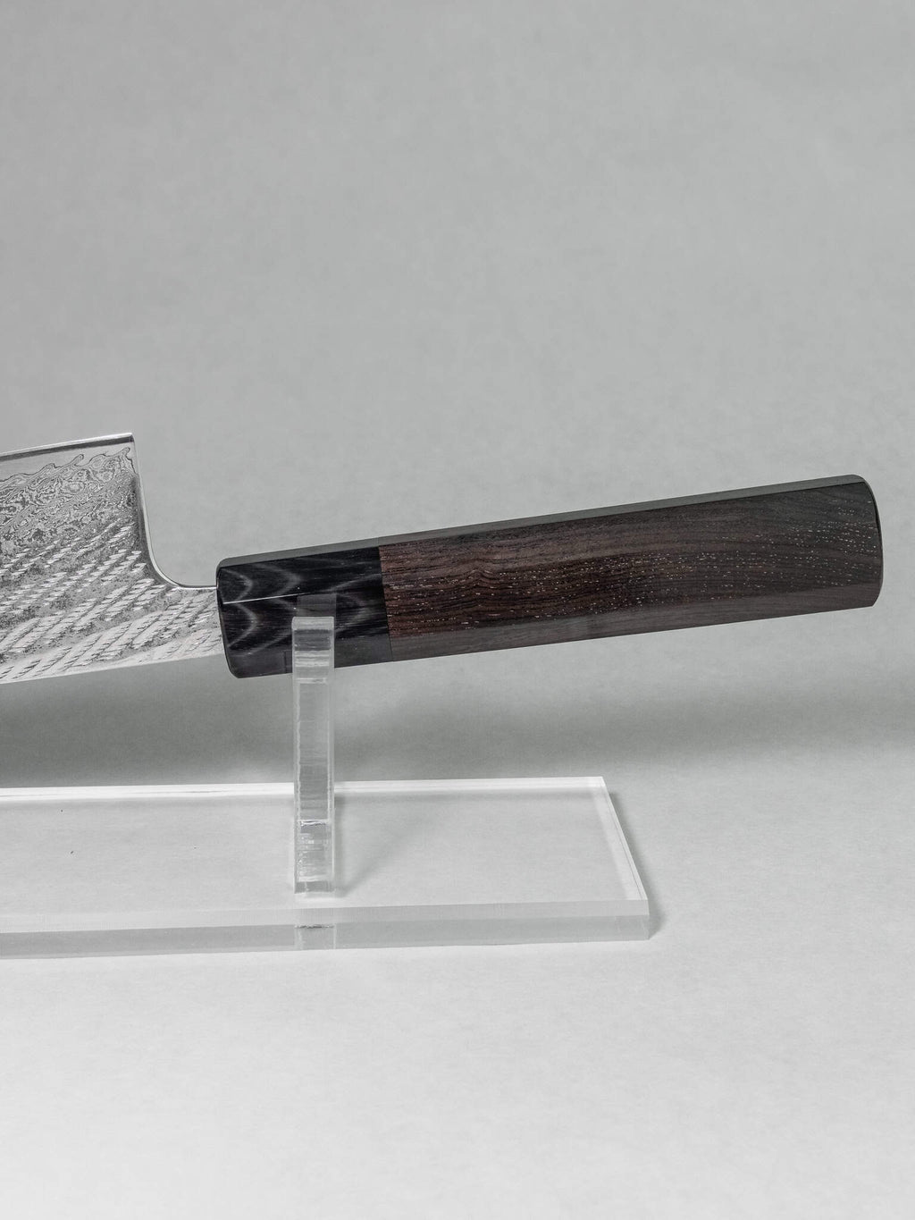 Close up of the octagonal ebony and buffalo horn handle on the Tsunehisa Gyuto knife