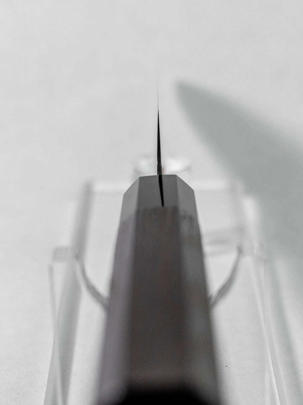 Spine thickness view showing slim 1.75mm Sujihiki blade. Choil view against a white background.
